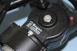 lot 9 image: Bogen Manfrotto Professional Video Tripod with Fluid Head and Pan Bar  Arm