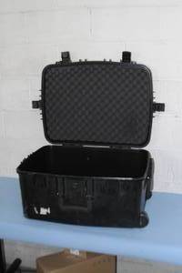 lot 12 image: Protective Molded Plastic Lightweight Equipment Case with Telescoping Handle and Wheels