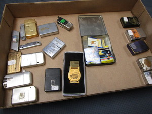 lot 108 image: Lighters, Tin