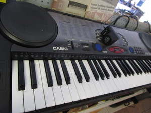 lot 152 image: Casio Keyboard