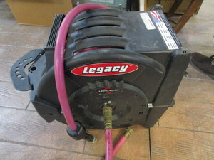 lot 91 image: Garden Hose & Reel