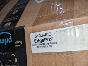 lot 92 image: EasyFlex Heavy-Duty No-Dig Landscape Edging with Anchoring Spikes, Black