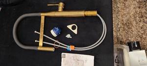 lot 15 image: Grohe Essence 1.75 GPM Single Hole Pull Out Kitchen Faucet with StarLight and SilkMove Technology