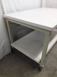 MSRP $1200 Fantastic Rolling Work Table Heavy Duty Packing Bench Laminate Top &amp Second Shelf&nbsp 5x3x3 - Has Large Locking Wheels For Easy Movement &amp Stationary Positioning - Great Condition