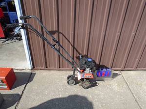 Husquevarna mini tiller. Good compression. Consignor states it runs but we didnt try. As shown.