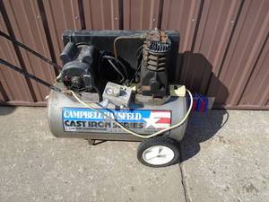 Campbell Hausfield cast iron air compressor. 20 gallon 3.5hp. Consignor states it works. As shown.
