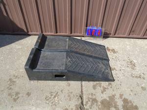 Low profile poly car  ramps. Good used condition. As shown.