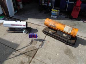 Qty of 2 kerosene heaters for parts or repair with some fuel. As shown.