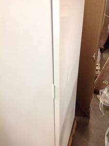 White Cabinet for Storage (has dents and damage on the sides and back) review all pictures