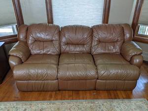 lot 61 image: Well Loved Brown Reclining Sofa