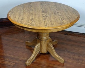 lot 10 image: Light Wood Drop Leaf Pedestal Dining Table