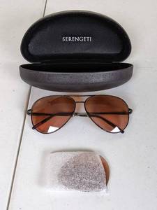 lot 87 image: Serengeti Sunglasses with Case, Cleaning Cloth and Spare Lens