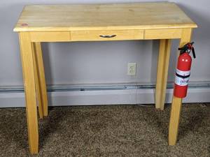 lot 127 image: Standing TableDesk with Fire Extinguisher