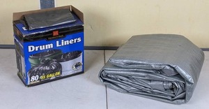 lot 121 image: 55-Gallon Garbage Bags and Large Tarp