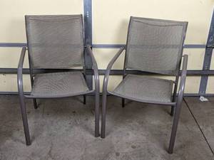 lot 132 image: Pair of Metal and Mesh Outdoor Patio Chairs