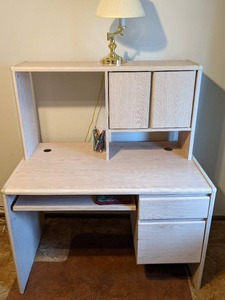 lot 82 image: White Computer Desk with Contents Lamp, Floor Mat, Pens, and more