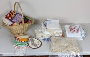 lot 121 image: Assortment of Doilies, Kitchen Towels, Potholders, MN Twins Homer Hanky and More