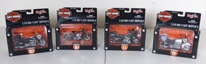 lot 76 image: Lot of 4 NEW Harley Davidson 118 Die Cast  Replica Motorcycles
