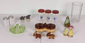 lot 153 image: Charming Collection of Vintage Kitchen Wares Salt & Pepper Shakers, Measuring Cup, Juicer and More