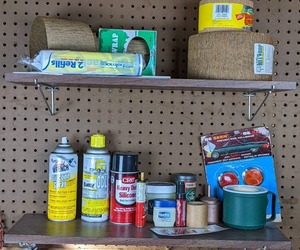 lot 53 image: Lot of HouseholdAutomotive Lubricants, Tree Repair Wrap and Two Shelves