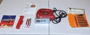 lot 56 image: Tool Shop Variable Speed Jig Saw with Extra Blades