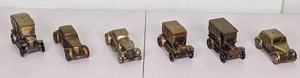 lot 21 image: Collection of (6) 1974 Banthrico Inc Die-Cast Rolling Car Coin Banks