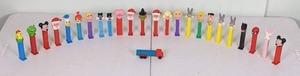 lot 154 image: Lot of 25 Vintage PEZ Dispensers