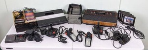 lot 2 image: Vintage Pair of Atari Systems & Large Collection of Games Atari 2600, Atari 7800 Pro System, Pac-Man, Donkey Kong, Laser Blast, & More