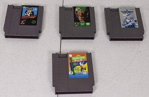 lot 148 image: Lot of 4 Nintendo Games Hogans Alley, Tecmo Bowl, Top Gun, Sesame Street