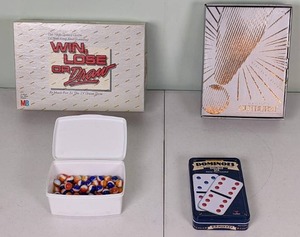 lot 168 image: Lot of Games Win, Lose or Draw Electronic Outburst, Dominoes and a Box of Marbles