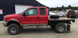 lot 1 image: 2001 Ford F250 XLT SD 4x4 Flat Bed
