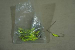 lot 215 image: Bag of Bright Yellow Fishing Jigs