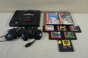 lot 281 image: Sega Genesis Game System with Games and Controllers