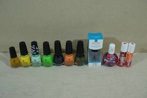 lot 200 image: Assorted Nail Polish and Cuticle Oil