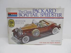 lot 62 image: Vintage Monogram Packard Boat Tail Speedster