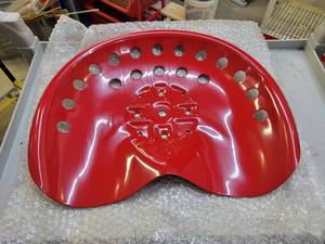 lot 239 image: New Farmall Red Stamped Steel Tractor Seat