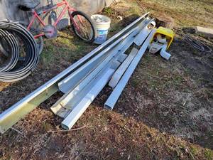 lot 348 image: Assortment of Metal Gutter and Downspouts - (3) 10 Gutters, (1) 11 Gutter, Assorted Elbows, Brackets and Downspouts