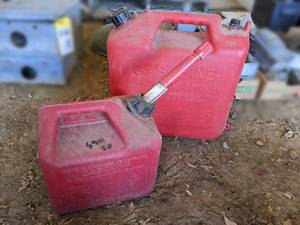 lot 109 image: Pair of Plastic Gas Cans - 5 and 2 Gallon - One is old Style w Vent on Back