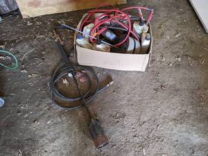 lot 130 image: Propane Weed Burner, Jumper Cables, Bottles of Oil - Some are almost full and some are almost empty