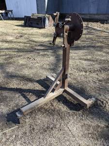 lot 141 image: Well Built Heavy Duty Homemade Engine Stand - Measures about 50 Tall x 39 Wide x 26 Deep - Rolls Nice - Looks like it could hold a good size diesel engine