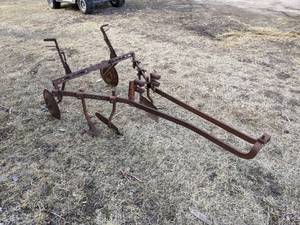 lot 142 image: Antique David Bradley Lawn Tractor Cultivator - Part No. 917-57524 - Very Cool Piece