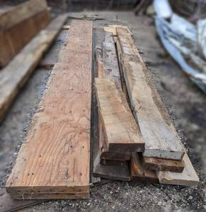lot 10 image: Large Lot of Lumber - 2x14, 2x5, 2x10, 2x6, 2x8 - 10 Pieces up to 150 Long - See Description