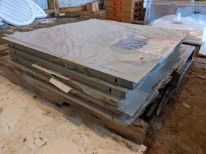 lot 203 image: Lot of (5) NOS - ACUDOR 24 x 24 Metal Access Doors - Part No. UF-5000 - Some dont have original Packaging - slight surface rust on edges