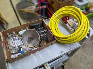 lot 240 image: Unused 14 x 50 Air Hose and Assorted Garage Items