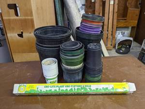 lot 311 image: 24 Grow Light Fixture and Bulb, Large Assortment of Plastic Growing Pots