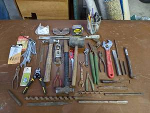 lot 316 image: Lot of Hand Tools, Crescent Wrench, Chisels, Tape Measure and More  A Hammer