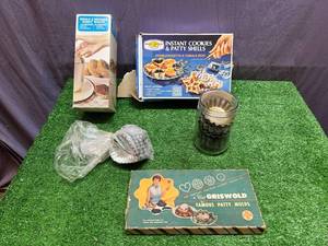 lot 33 image: Griswold Patty Molds & Cookie Molds