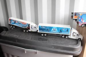 lot 148 image: Lot of (2) Semi Tractor Trailer Die-cast Collectible - NBA All-Star Dallas 2010, USA Basketball Red White and Hoops Tour