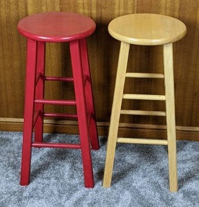 Pair of Wooden Barstools (One Red, One Natural Wood)