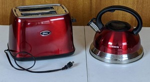 Red Oster Toaster and Red Suteck Tea Kettle